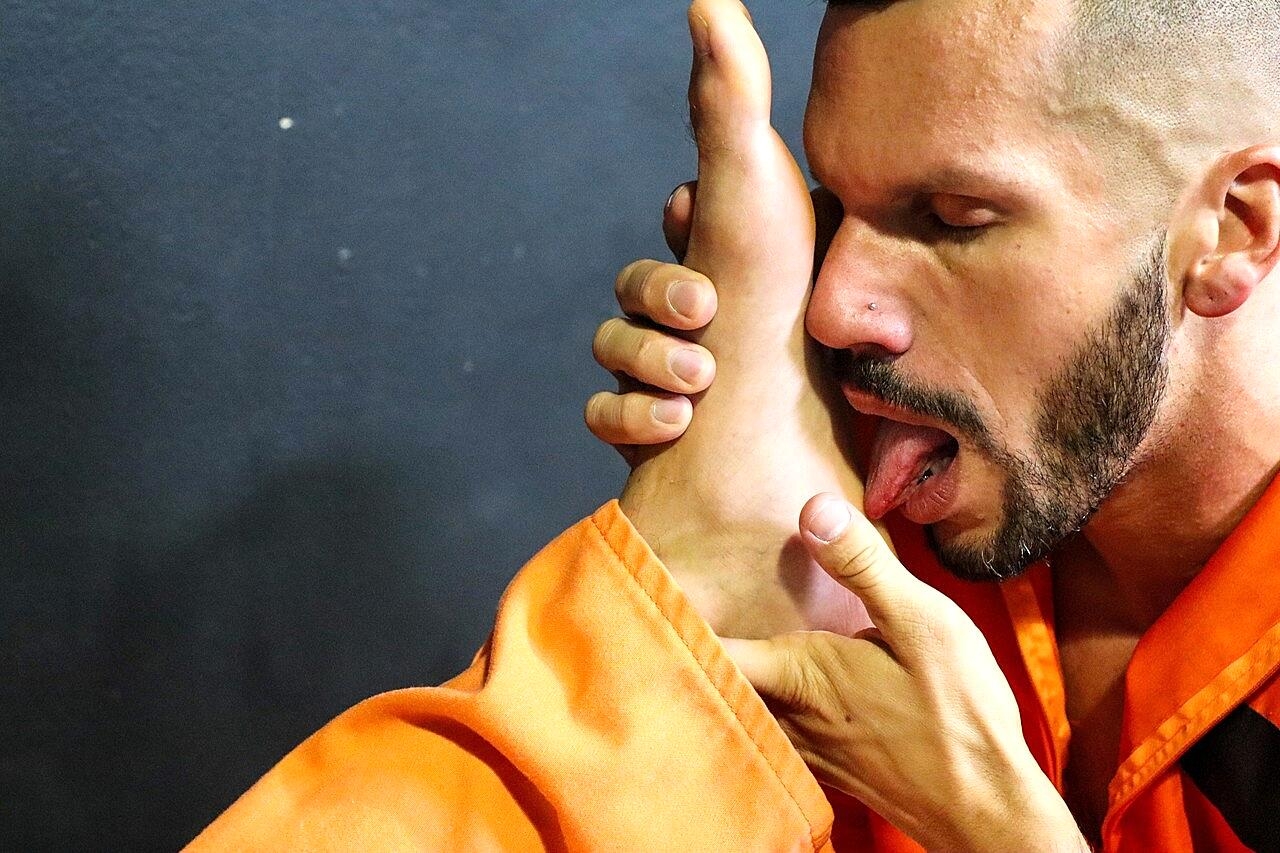 Gay men Marco Lorenzo & Amone Bane have a foot fetish session in prison