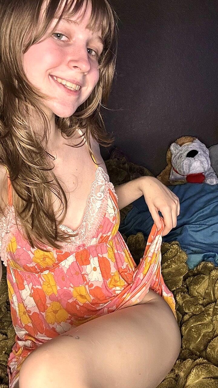 Sexy amateur teen Teensy Bella poses seductively in her nightgown