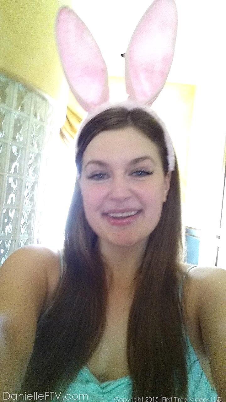 Plump amateur Danielle takes topless and clothed selfies around the house